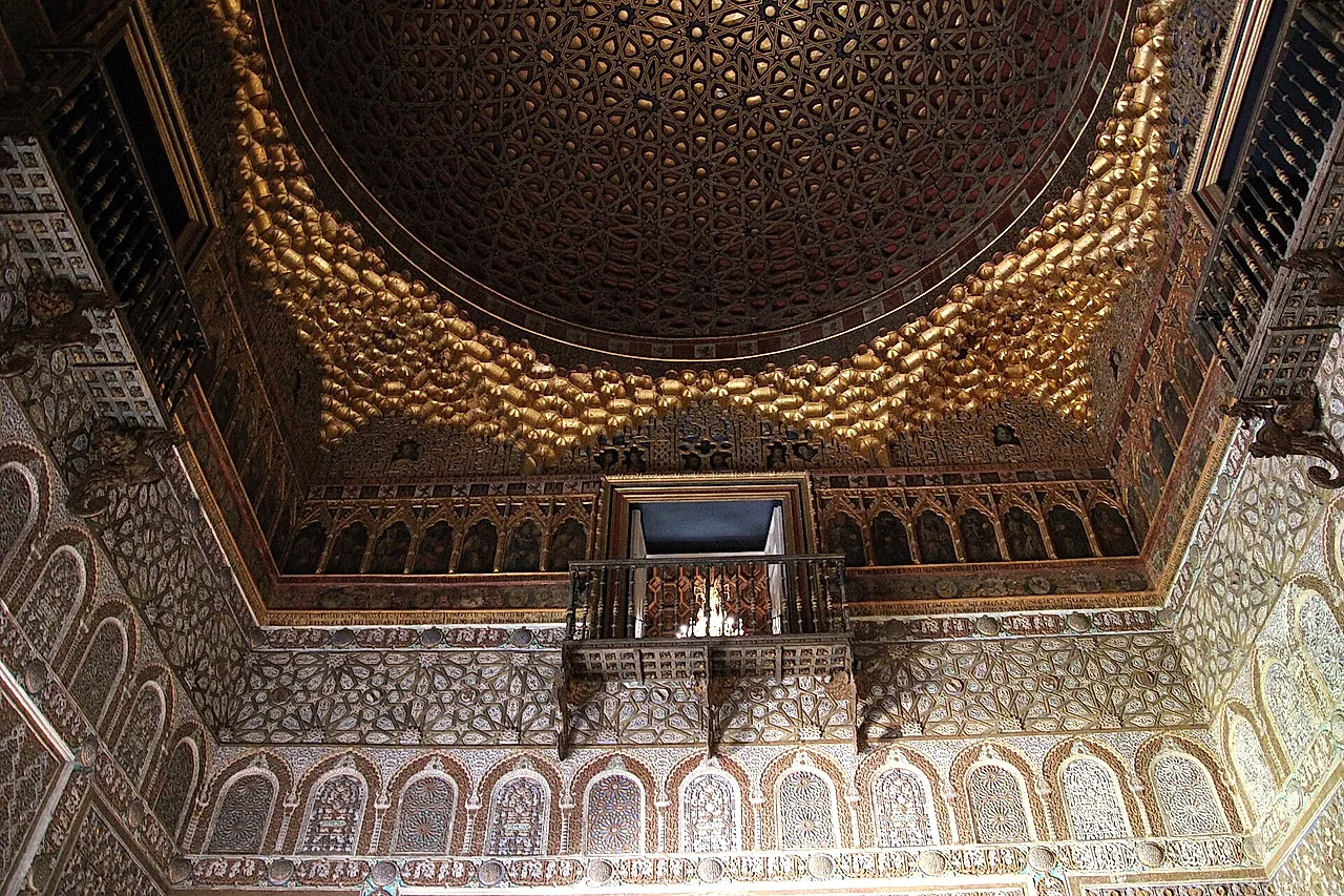 The gilded half-orange dome of the Salón de Embajadores, with its balconies