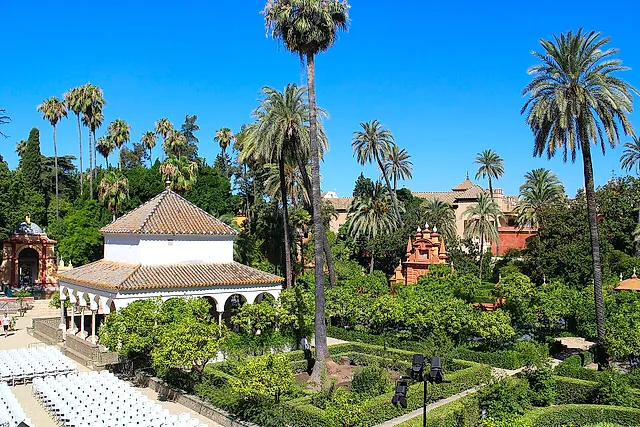 The Pabellón de Carlos V seen from above among the palm trees of the gardens
