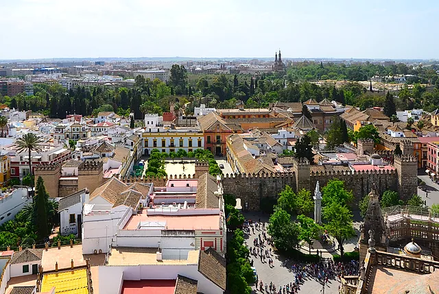 The walls of the Alcázar and Plaza del Triunfo seen from the Giralda, with the gardens beyond